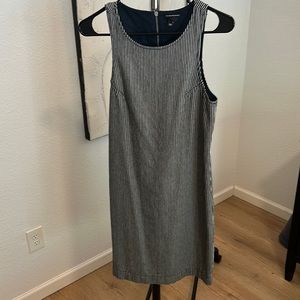 Club Monaco sleeveless dress with back zipper.  Navy and white stripe.